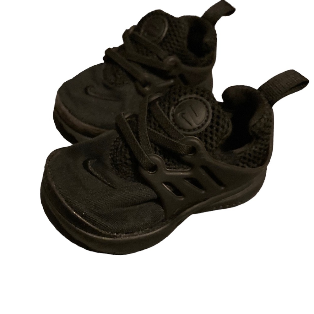 All black Huarache sneakers